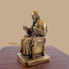 Statua Padre Pio seduto